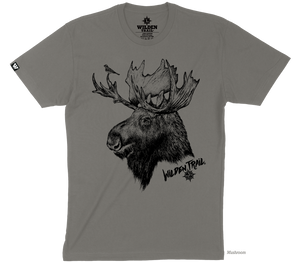 A gray brown colored tshirt with a moose sketched image on the front of the tshirt. There is a small bird on the Moose's antler. The words "Wilden Trail" and the logo appear on the bottom right hand side of the image.